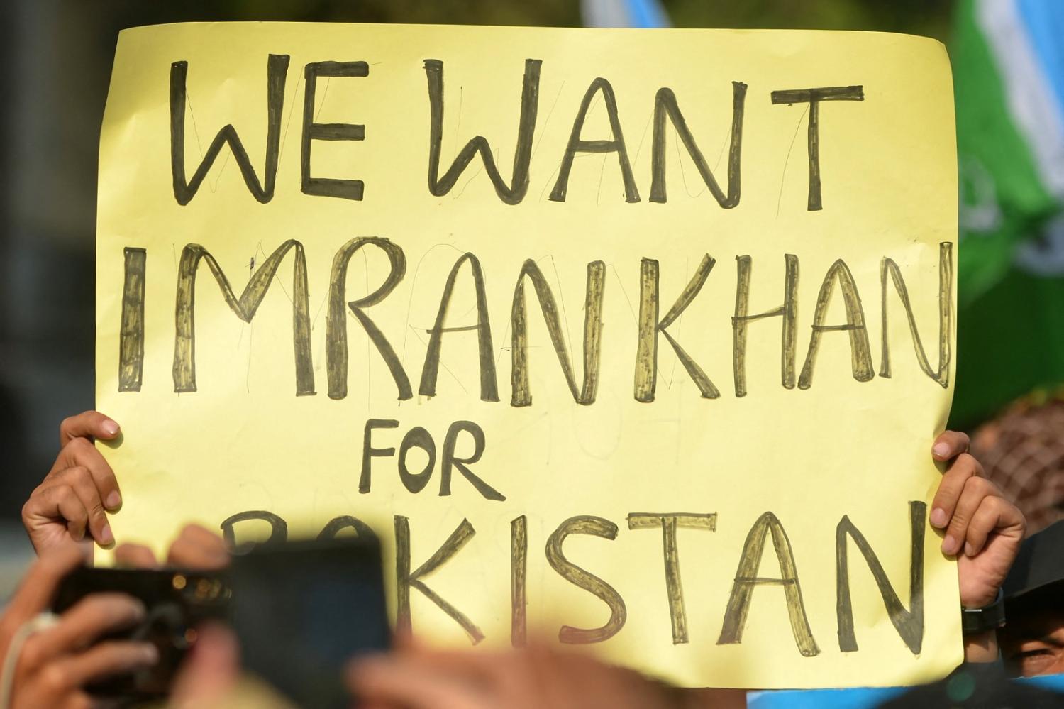 A supporter of the Pakistan Tehreek-e-Insaf (PTI) during a protest in Karachi on 10 February 2024 amid claims the election result delay is allowing authorities to rig vote-counting (Rizwan Tabassum/AFP via Getty Images)